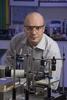 Wyatt Vreeland, wearing safety goggles and standing at a lab bench.